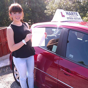 Young woman after passing driving test first time in chesterfield